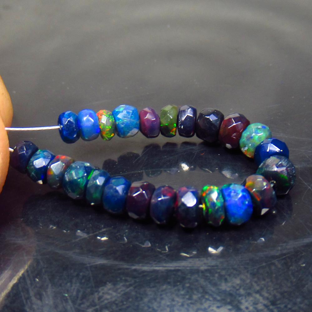 5.43 Ct Natural 24 Drilled Black Faceted Fire Opal: No Reserve! Title: 5.43 Ct Natural 24 Drilled Black Faceted Fire Opal Beads Stone Clarity: Translucent Gemstone: Natural Faceted BlackOpal Beads Carat Weight: 5.43 Size/Dimensions: 3.50 to 4.50 mm / 2