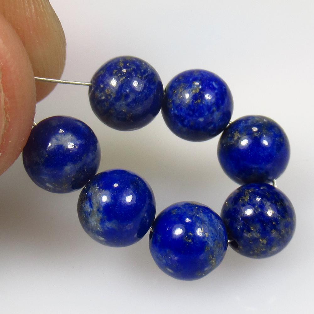 5.16 Ct Natural 7 Drilled Blue Lapis Lazuli Round Ball: No Reserve! Title: 5.16 Ct Natural 7 Drilled Blue Lapis Lazuli Round Ball Beads Stone Clarity: Opaque Gemstone: Natural Lapis Lazuli Beads Carat Weight: 5.16 Size/Dimensions: 6.50 to 6.60 mm / 7 PC's 
