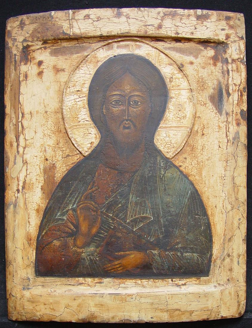 Christ Pantocrator/Saviour: Title: Christ Pantocrator/Saviour Origin: Russian Antique Religious Icon Date/Period: 17/18th century Material: gesso, tempera Size: 27 x 22 cm Provenance: The iconic image of Christ Pantocrator ("Chr