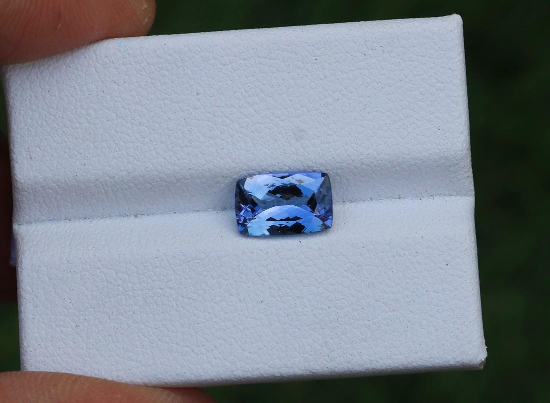 Natural IGI Certified Purple Blue Tanzanite Gemstone: Title: Natural IGI Certified Purple Blue Tanzanite Gemstone Color/Clarity: Purple Blue Gemstone Type: Gemstone Carat Weight: 1.71 Cts Dimensions: 9.11x6.00x3.75 mm Reserve: $100.00 Shipping: Dome