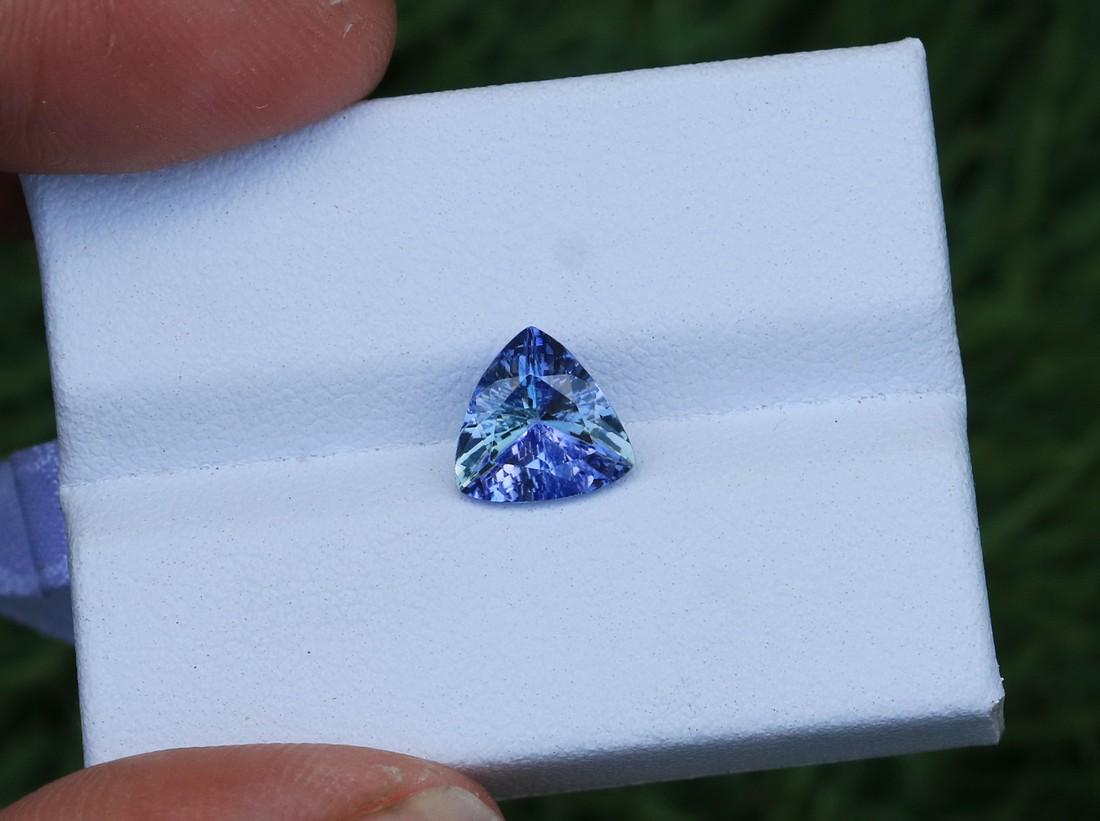 Natural IGI Certified Purple Blue Tanzanite Gemstone: Title: Natural IGI Certified Purple Blue Tanzanite Gemstone Color/Clarity: Purple Blue Gemstone Type: Gemstone Carat Weight: 1.81 Cts Dimensions: 8.20x8.33x4.50 mm Reserve: $100.00 Shipping: Dome