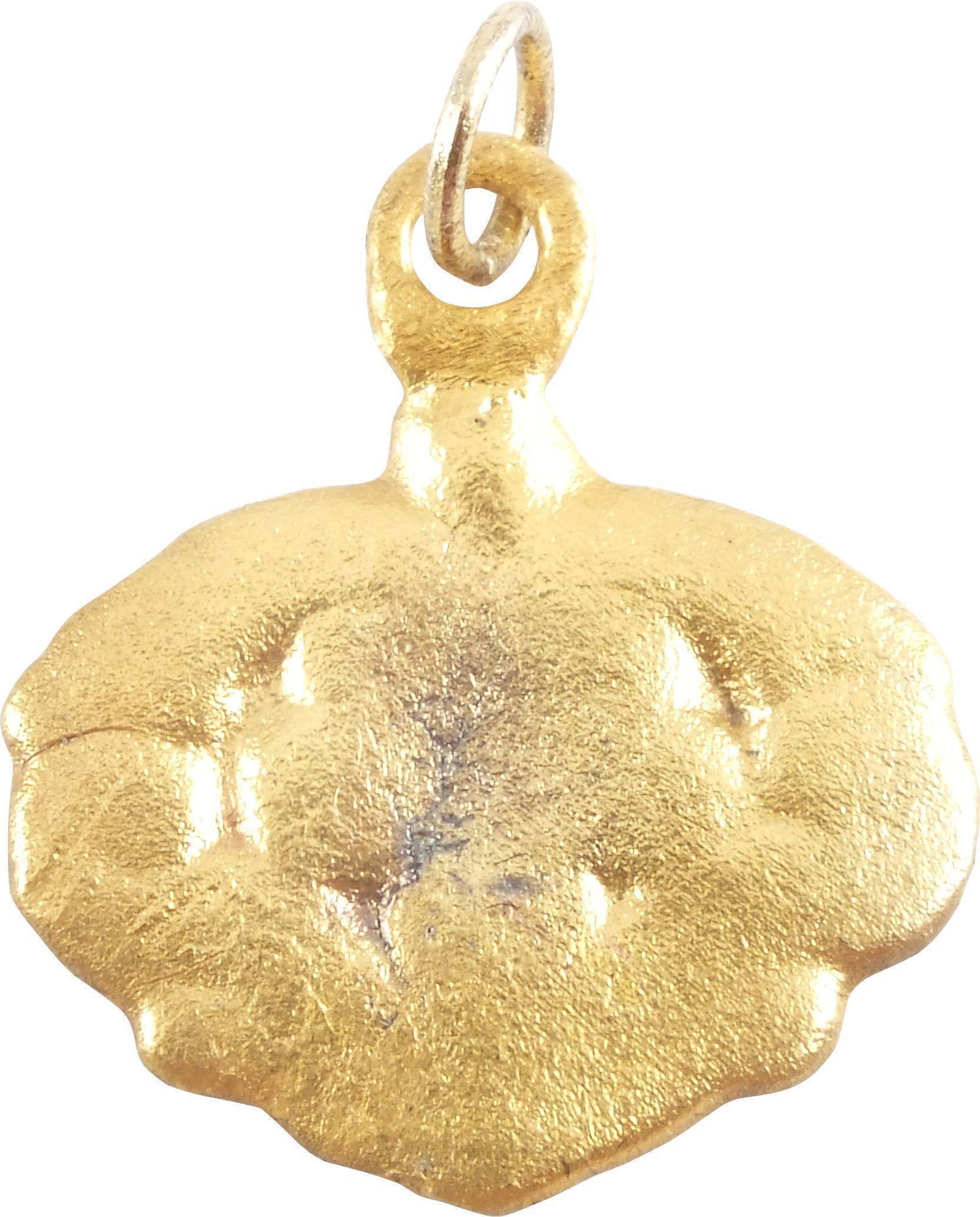 VIKING HEART PENDANT NECKLACE C.10TH-11TH CENTURY AD: Large example over 3/4" width of broad form with raised edges sprouting a trefoil which fills the field. The trefoil (triple leaf) motif was popular with Vikings and believed to represent fertility wi