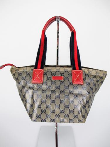 GUCCI Handbag in coated monogram canvas (1 of 15)