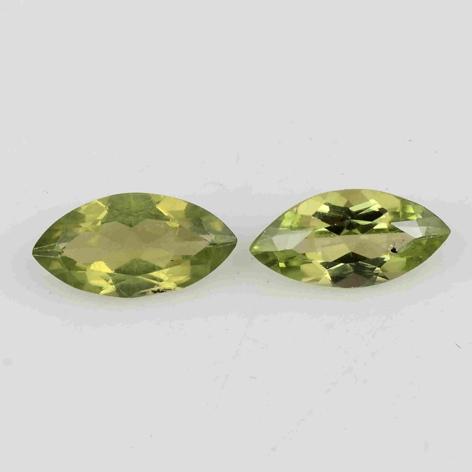 2.15 Carat Green Color Natural Marquise Peridot Loose: No Reserve! Title: 2.15 Carat Green Color Natural Marquise Peridot Loose Gemstone 2 Pieces Brand: Gems Trading Center Gemstones: Peridot Carat Weights: 2.15 Size/Dimensions: 3H x 10L x 5W mm Shipping: