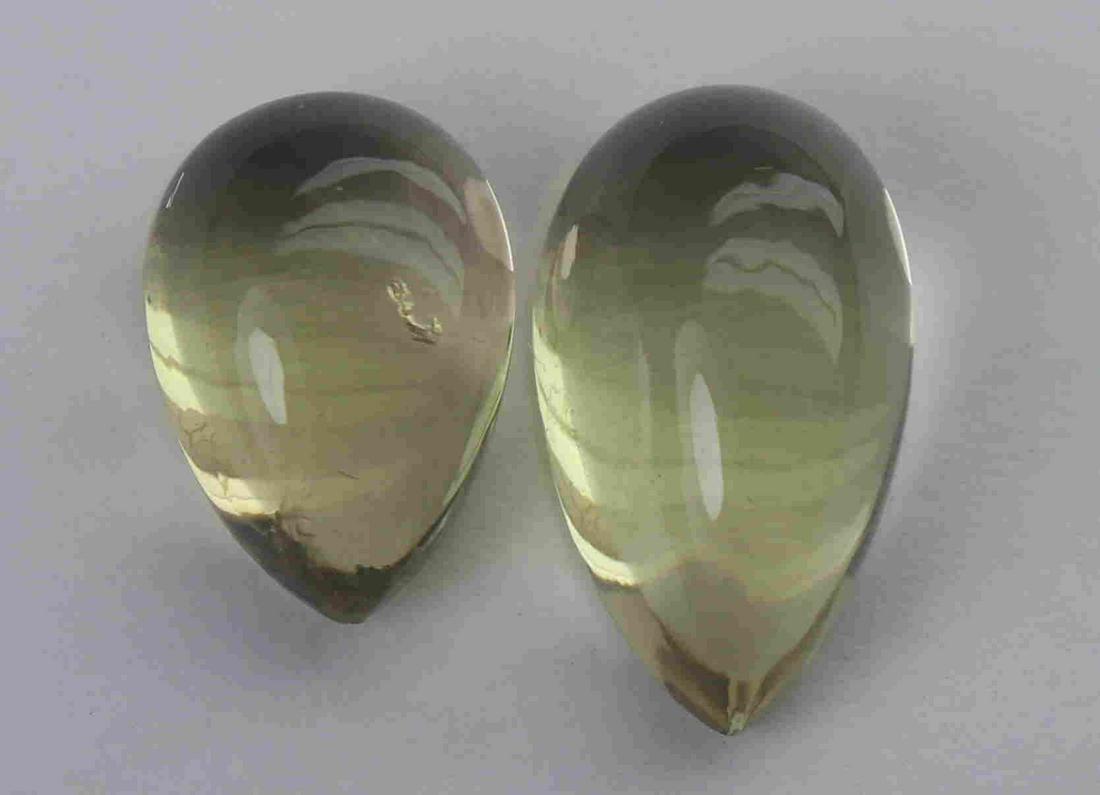 6.08 Cts Natural Lemon Quartz Lot: No Reserve! Title: 6.08 Cts Natural Lemon Quartz Lot Additional Information: Gemstone : Natural Lemon Quartz Weight : 6.08 Carats Dimensions : 12.71x7.33x5.61 mm 10.30x7.10x4.93 mm Shape : Pear Caboch