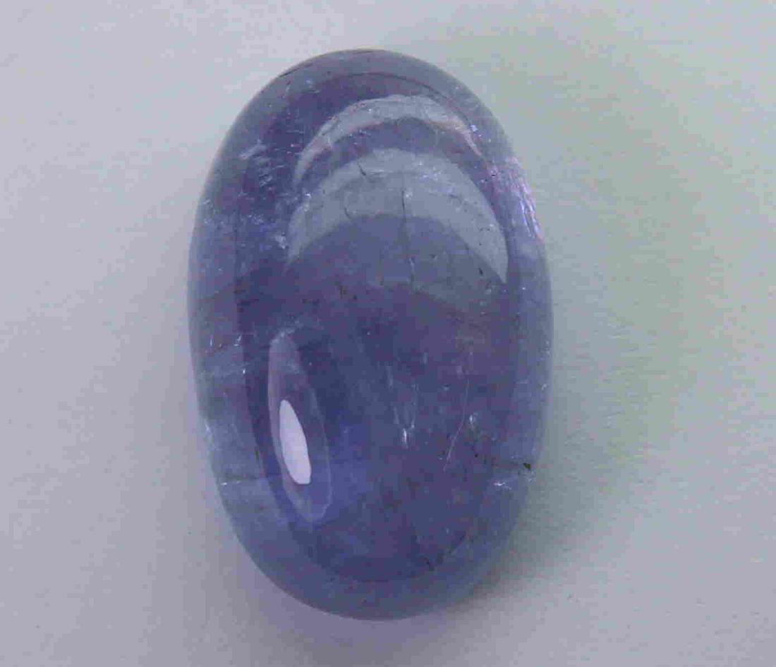 11.12 Cts Natural Tanzanite: No Reserve! Title: 11.12 Cts Natural Tanzanite Additional Information: Gemstone : Natural Tanzanite Origin : Tanzania Weight : 11.12 carats Dimensions : 16.40x10.35x6.82 mm Shape : Ovel Cabochon Color