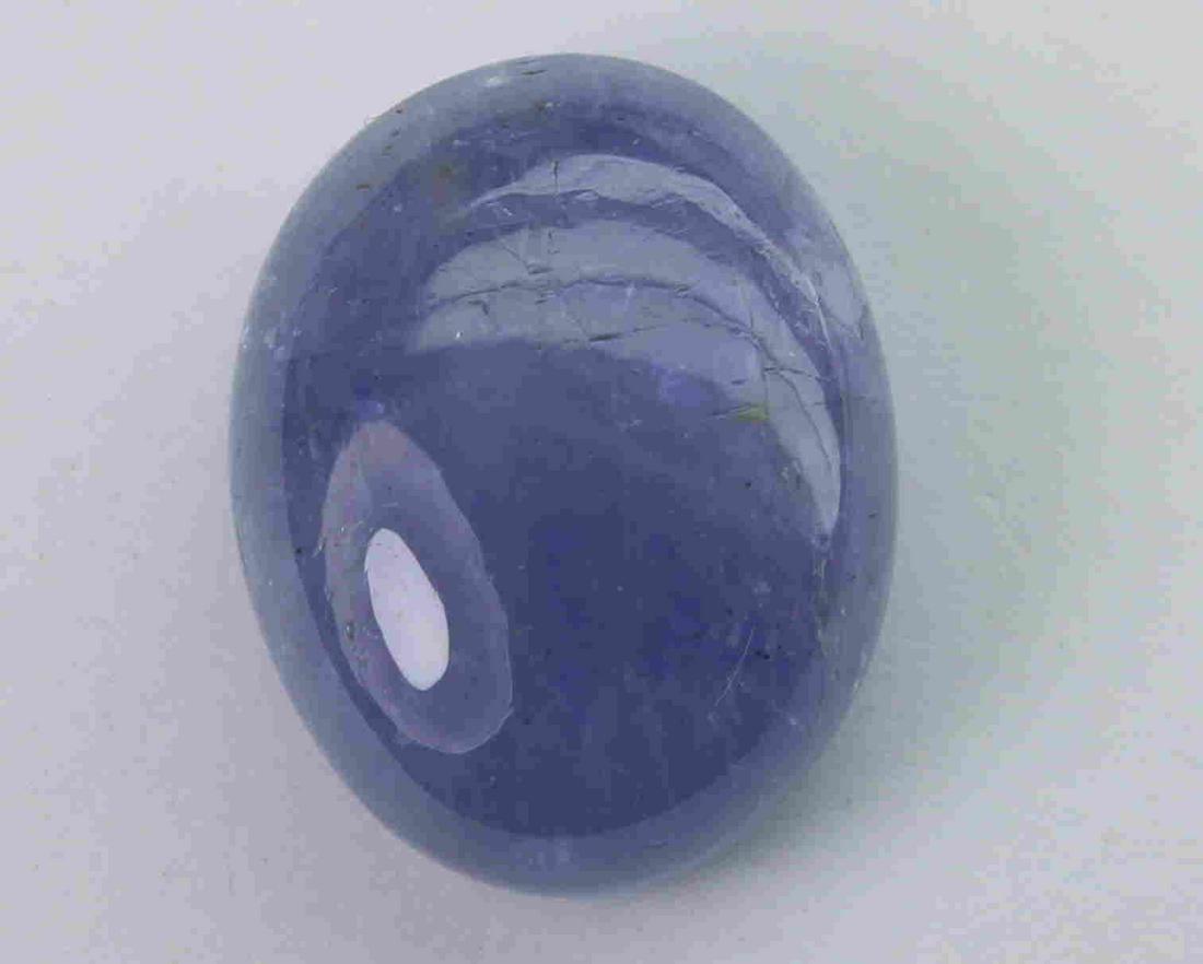 15.82 Cts Natural Tanzanite: No Reserve! Title: 15.82 Cts Natural Tanzanite Additional Information: Gemstone : Natural Tanzanite Origin : Tanzania Weight : 15.82 carats Dimensions : 16.72x13.07x7.59 mm Shape : Ovel Cabochon Color