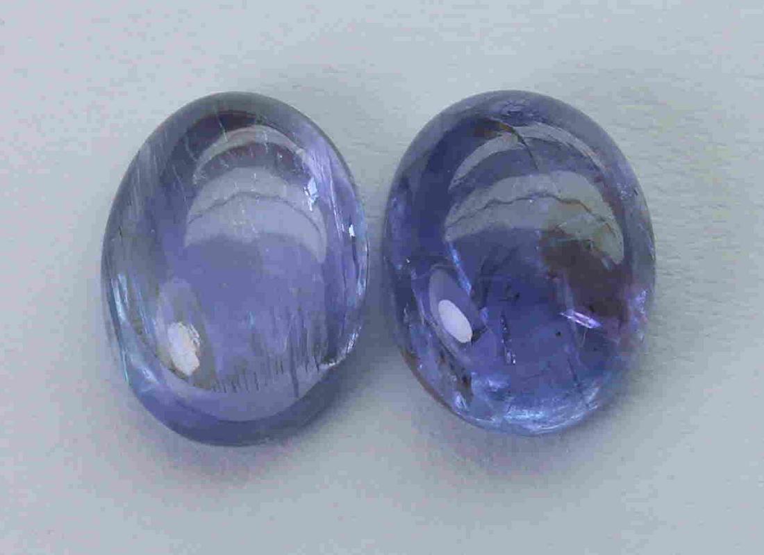 5.76 Cts Natural Tanzanite Lot: No Reserve! Title: 5.76 Cts Natural Tanzanite Lot Additional Information: Gemstone : Natural Tanzanite Origin : Tanzania Weight : 5.76 carats Dimensions : 10.21x7.49x3.82 mm,9.77x7.68x4.39 mm Shape : 