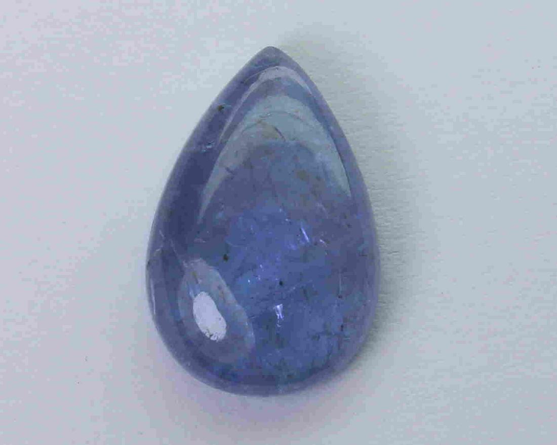 5.43 Cts Natural Tanzanite: No Reserve! Title: 5.43 Cts Natural Tanzanite Additional Information: Gemstone : Natural Tanzanite Origin : Tanzania Weight : 5.43 carats Dimensions : 14.56x9.66x4.30 mm Shape : Pear Cabochon Color : 