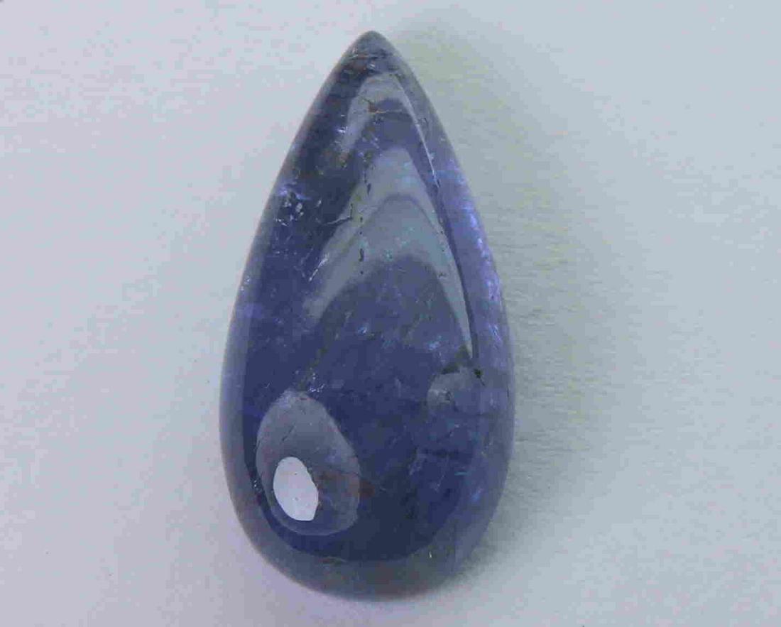 7.81 Cts Natural Tanzanite: No Reserve! Title: 7.81 Cts Natural Tanzanite Additional Information: Gemstone : Natural Tanzanite Origin : Tanzania Weight : 7.81 carats Dimensions : 17.58x8.96x5.55 mm Shape : Pear Cabochon Color : 
