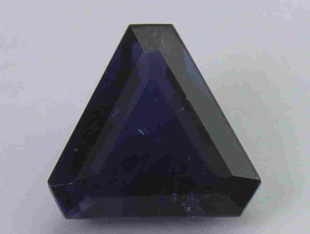 3.02 Cts Natural Iolite: No Reserve! Title: 3.02 Cts Natural Iolite Additional Information: Gemstone: Natural Iolite Weight: 3.02 Carats Measurements: 10.26x9.91x5.60 mm Shape / Cut: Trillion Cut Colour: Violet Blue Transpare