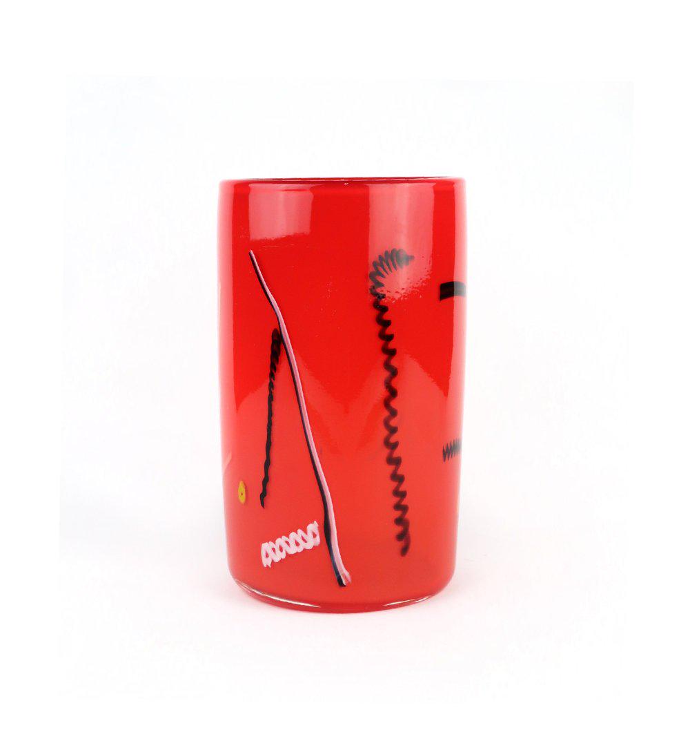 Red Bruce Pizzichillo and Dari Gordon Art Glass Vase: Bright and beautiful red cylindrical art glass vase by husband and wife team, Bruce Pizzichillo and Dari Gordon, with black, white, yellow and orange fused accents. The Pizzichillo Gordon studio has b