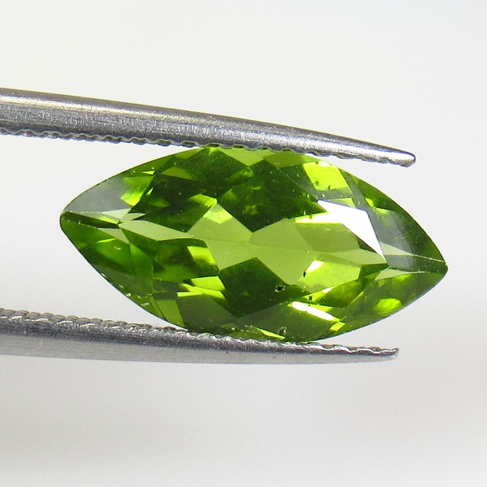 2.60 Ctw Natural Pakistan Peridot Marquise Cut: No Reserve! Title: 2.60 Ctw Natural Pakistan Peridot Marquise Cut Stone Clarity: VVS Gemstones: Peridot Carat Weights: 2.6 Size/Dimensions: 13.70 x 6.80 x 4.20 mm Additional Information: Top Class Lus