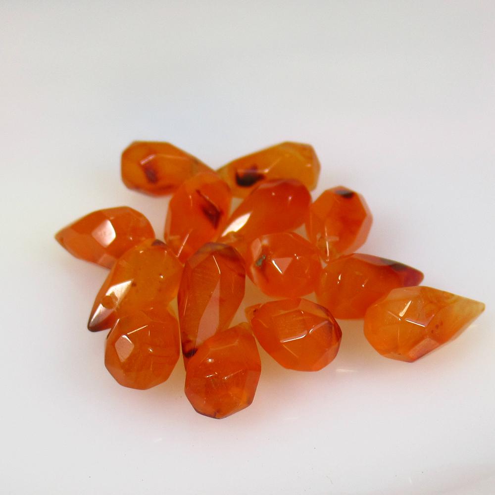 24.90 Ctw Natural 14 Drilled Orange Carnelian Pear: No Reserve! Title: 24.90 Ctw Natural 14 Drilled Orange Carnelian Pear Beads Stone Clarity: Semi-Transparent Gemstones: Natural Carnelian Beads Carat Weights: 24.9 Size/Dimensions: 10.0x5.5 - 12.8x5.5 