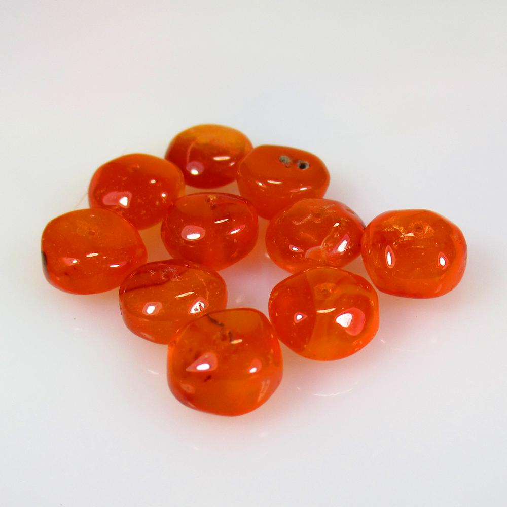 26.76 Ctw Natural 10 Drilled Orange Carnelian Round: No Reserve! Title: 26.76 Ctw Natural 10 Drilled Orange Carnelian Round Beads Stone Clarity: Semi-Transparent Gemstones: Natural Carnelian Beads Carat Weights: 26.76 Size/Dimensions: 8.30 - 8.70 mm / 1