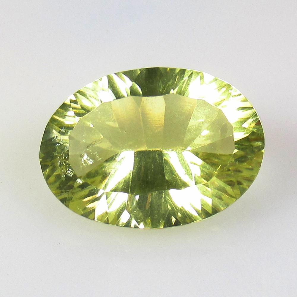 12.25 Ctw Natural Lemon Quartz Concave Cut: No Reserve! Title: 12.25 Ctw Natural Lemon Quartz Concave Cut Stone Clarity: VVS Gemstones: Lemon Quartz Carat Weights: 12.25 Size/Dimensions: 18.00 x 13.00 x 9.10 mm Additional Information: Good Lust