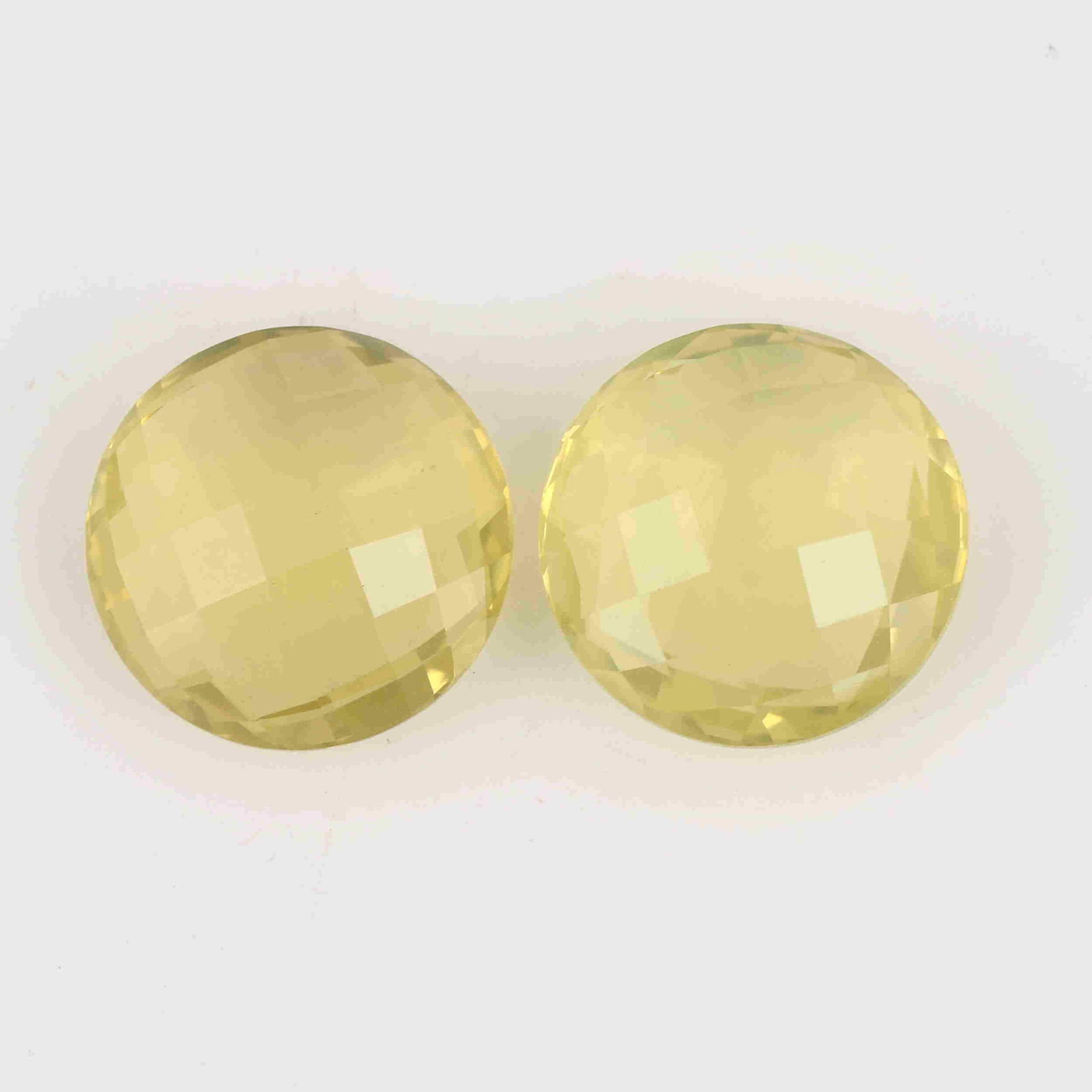 16.45 Carat Yellow Color Natural Round Lemon Quartz: No Reserve! Title: 16.45 Carat Yellow Color Natural Round Lemon Quartz Loose Gemstone 2 Pieces Brand: Gems Trading Center Gemstones: Lemon Quartz Carat Weights: 16.45 Size/Dimensions: 6.5H x 14L x 14W