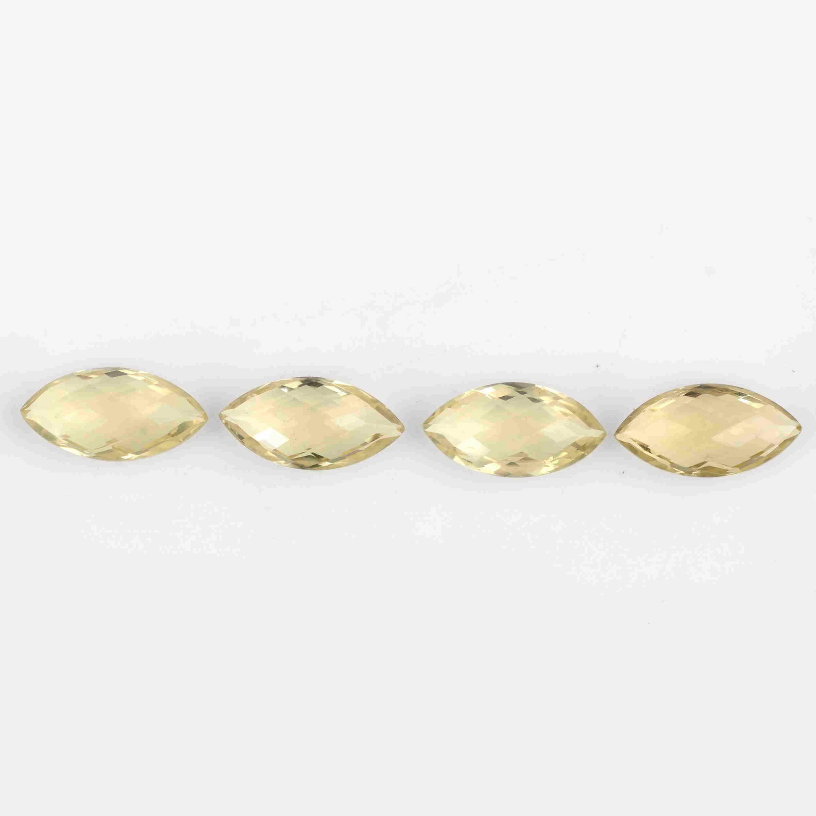 16.00 Carat Yellow Color Natural Marquise Lemon Quartz: No Reserve! Title: 16.00 Carat Yellow Color Natural Marquise Lemon Quartz Loose Gemstone 4 Pieces Brand: Gems Trading Center Gemstones: Lemon Quartz Carat Weights: 16 Size/Dimensions: 5.5H x 16L x 8W 