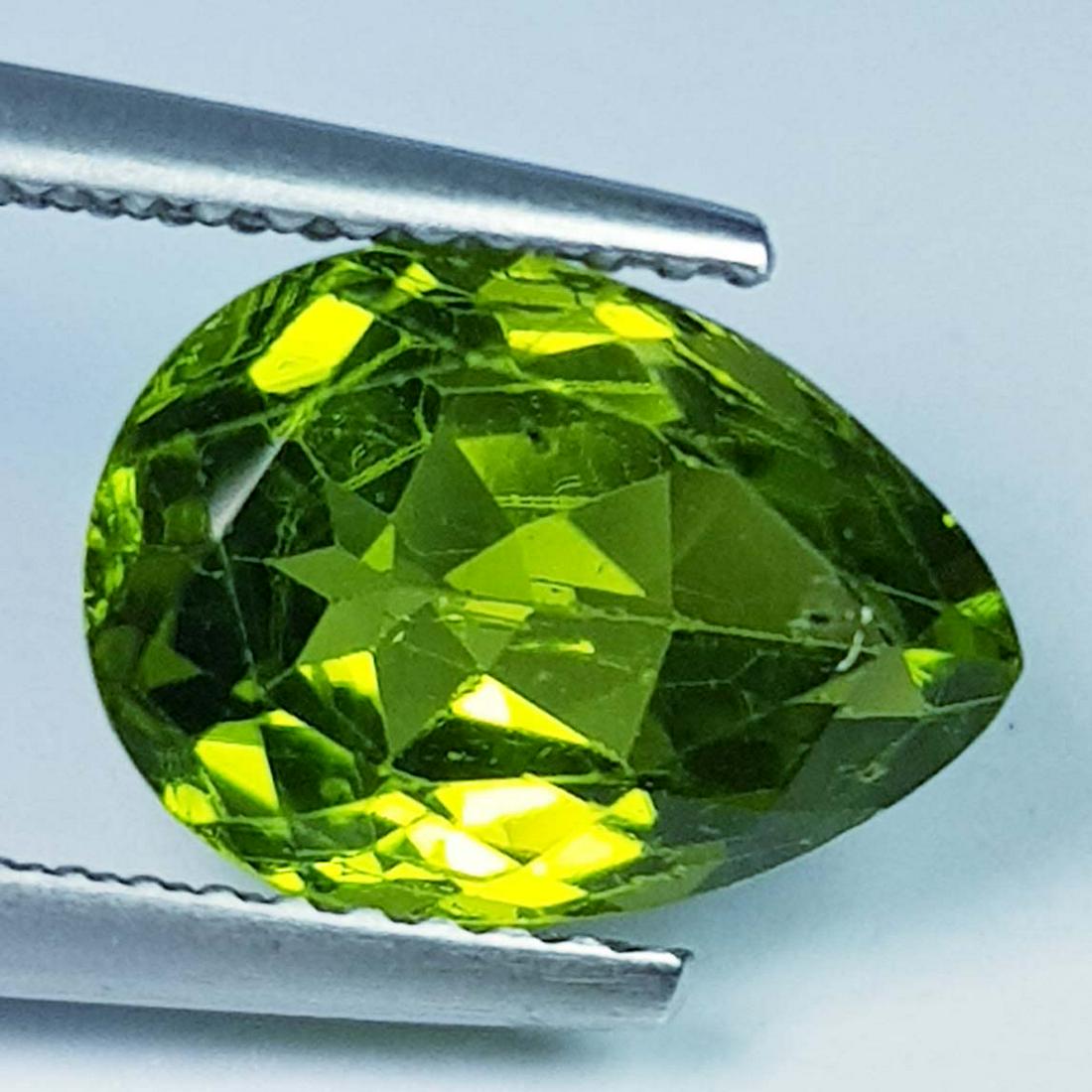 3.76 Ct Natural Peridot Pear Cut: No Reserve! Title: 3.76 Ct Natural Peridot Pear Cut Color/Clarity: IF - VVS Gemstones: Loosegemstone Carat Weight: 3.76 Size/Dimension: 11.10 x 8.00 x 5.80 Additional Information: Pear / Pakistan Ship