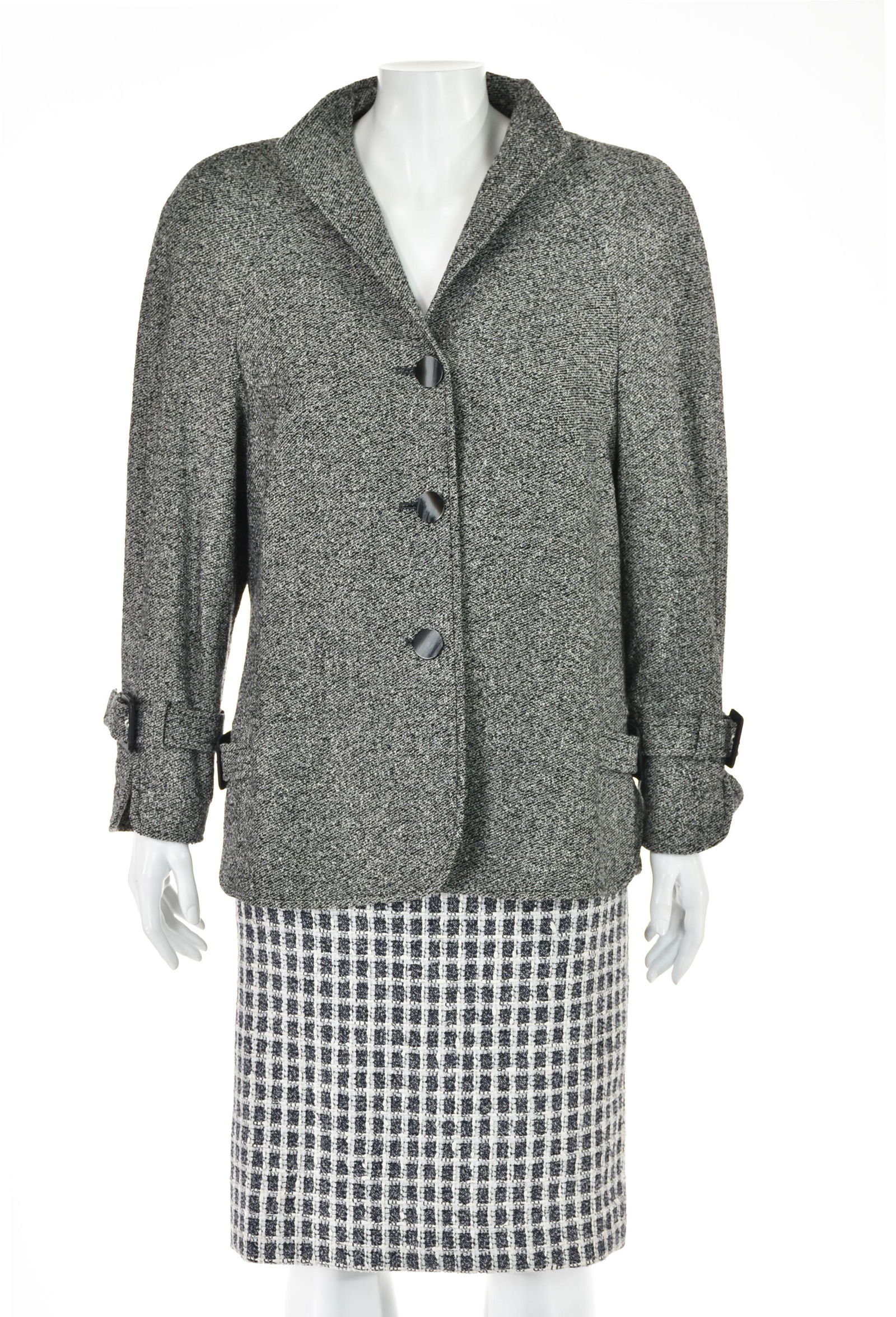 ESCADA Black & White Tweed Jacket: Great looking black and white tweed jacket from Escada features raglan sleeves and cuff belts with leather buckles. It also has buckles on the side vents near the hemline. Fabric is a soft silk, wool