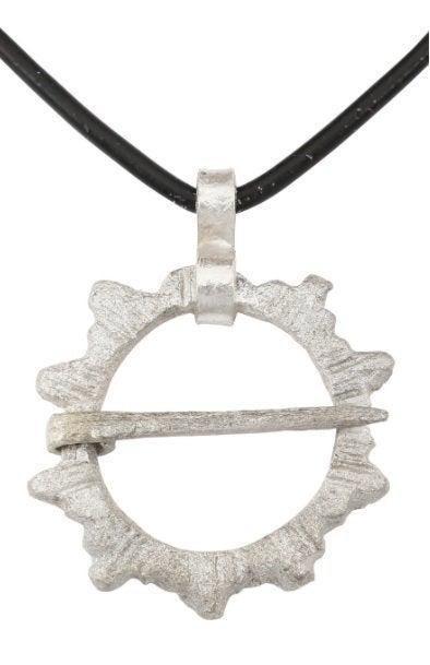 ANCIENT VIKING PROTECTIVE BROOCH NECKLACE: Worn in numbers on the surface of the jerkin, these small metal brooches provided a measure of protection against sword cuts and, in fact, were a form of armor. See current Public Television programmi