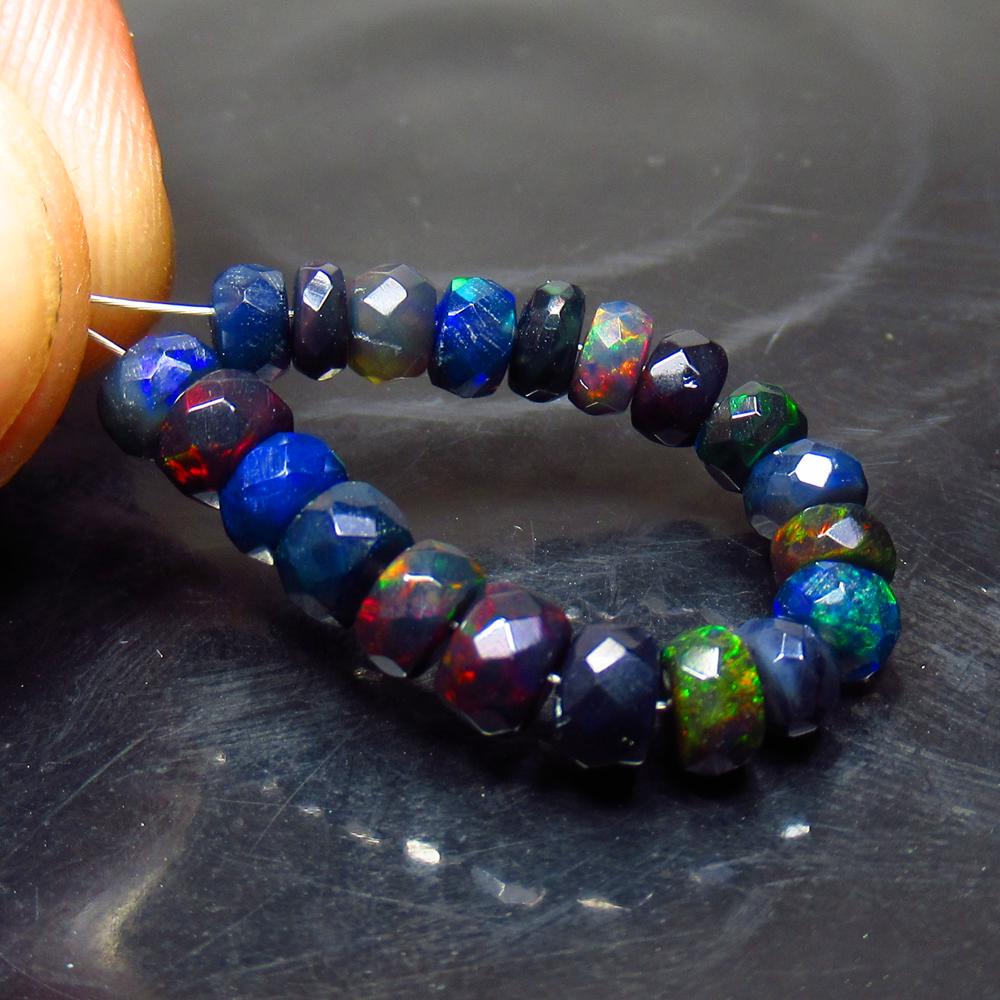 5.88 Ct Natural 20 Drilled Faceted Black Opal Beads: Title: 5.88 Ct Natural 20 Drilled Faceted Black Opal Beads Stone Clarity: Translucent Gemstone: Natural Faceted Black Opal Beads Carat Weight: 5.88 Size/Dimensions: 4.20 to 4.70 mm / 20 PC's Additiona
