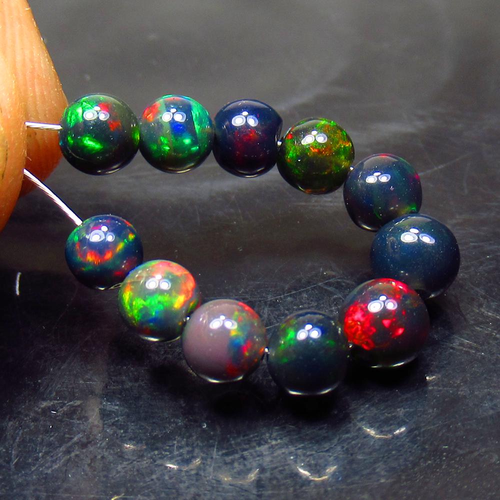 5.55 Ct Natural 11 Drilled Black Fire Opal Ball Beads (1 of 2)