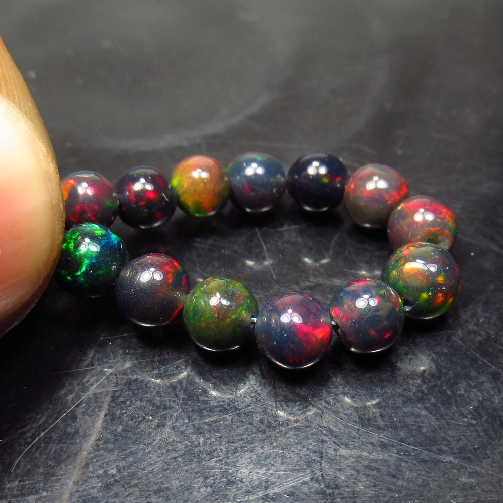 5.57 Ct Natural 13 Drilled Black Fire Opal Ball Beads (1 of 2)