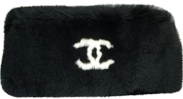 Chanel Black Lapin Rabbit Fur Wrist Cuff Bracelet: Chanel Black Lapin Rabbit Fur Wrist Cuff Bracelet. We offer this unique fur bracelet cuff with super soft lapin rabbit in a deep black color with white CC Logo for CoCo. This wrist fur is quite rare a