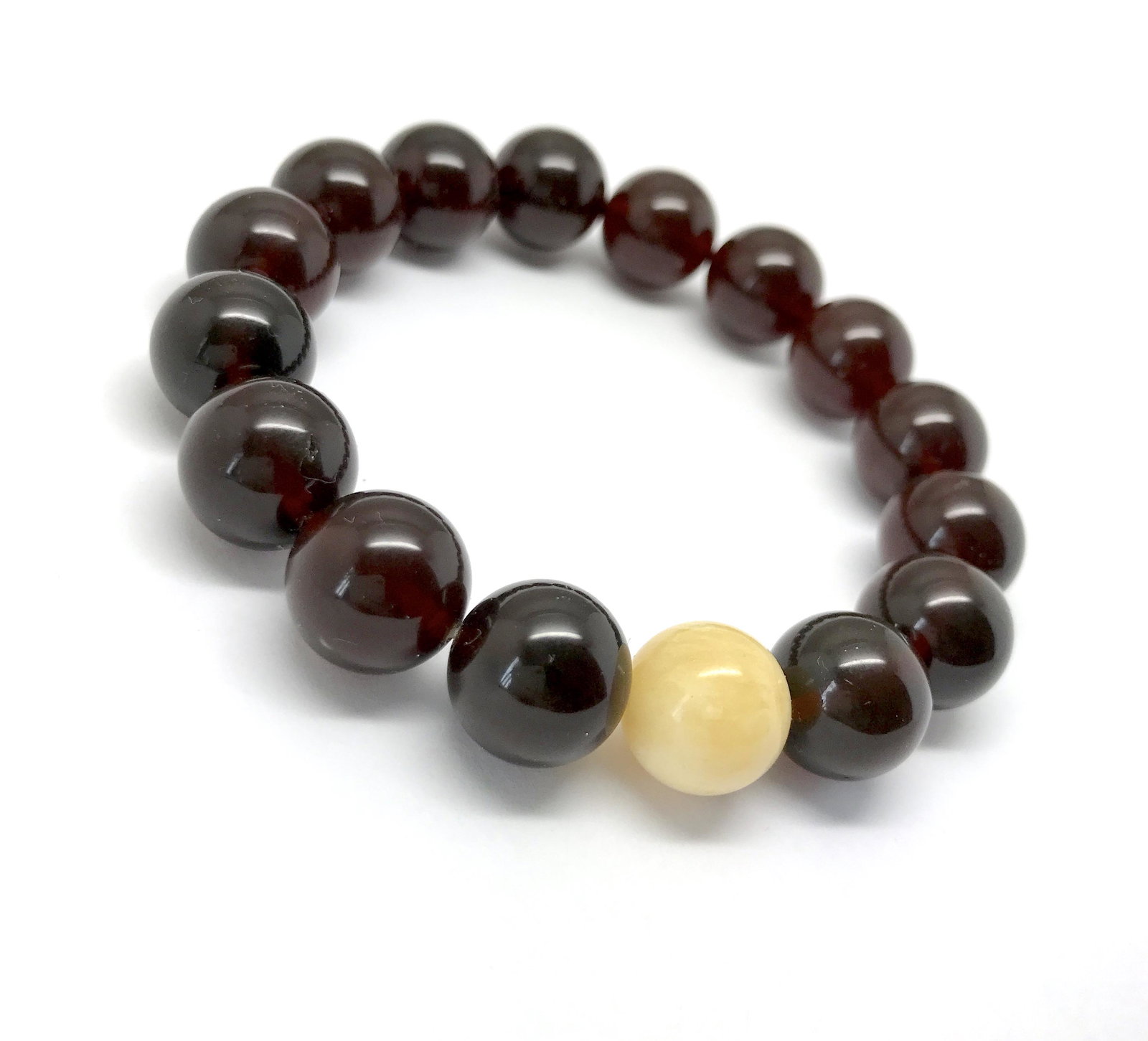 Amazing Amber Bracelet made from Round Amber beads: Title: Amazing Amber Bracelet made from Round Amber beads Metal Purity: None Gemstone: Amber Weight: 14.0 g Size: Bead size: 11.5 mm Bead size: 0.453 inches Made Of: Reconstituted Amber Additional Inf