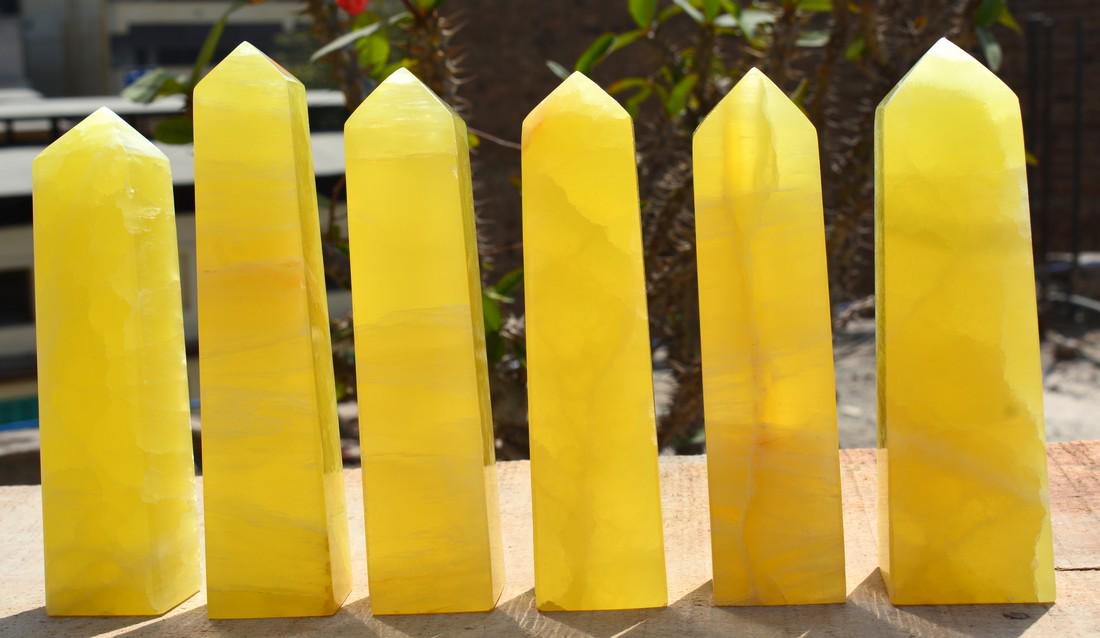 2 Kg Full Lemon Calcite Towers 6 Pieces: Title: 2 Kg Full Lemon Calcite Towers 6 Pieces Origin: Afghanistan Weight: 2 Kg Size/Dimensions: 6 Pieces Description: Natural Reserve: $150.00 Shipping: Domestic: Flat-rate of $70.00 to anywhere with
