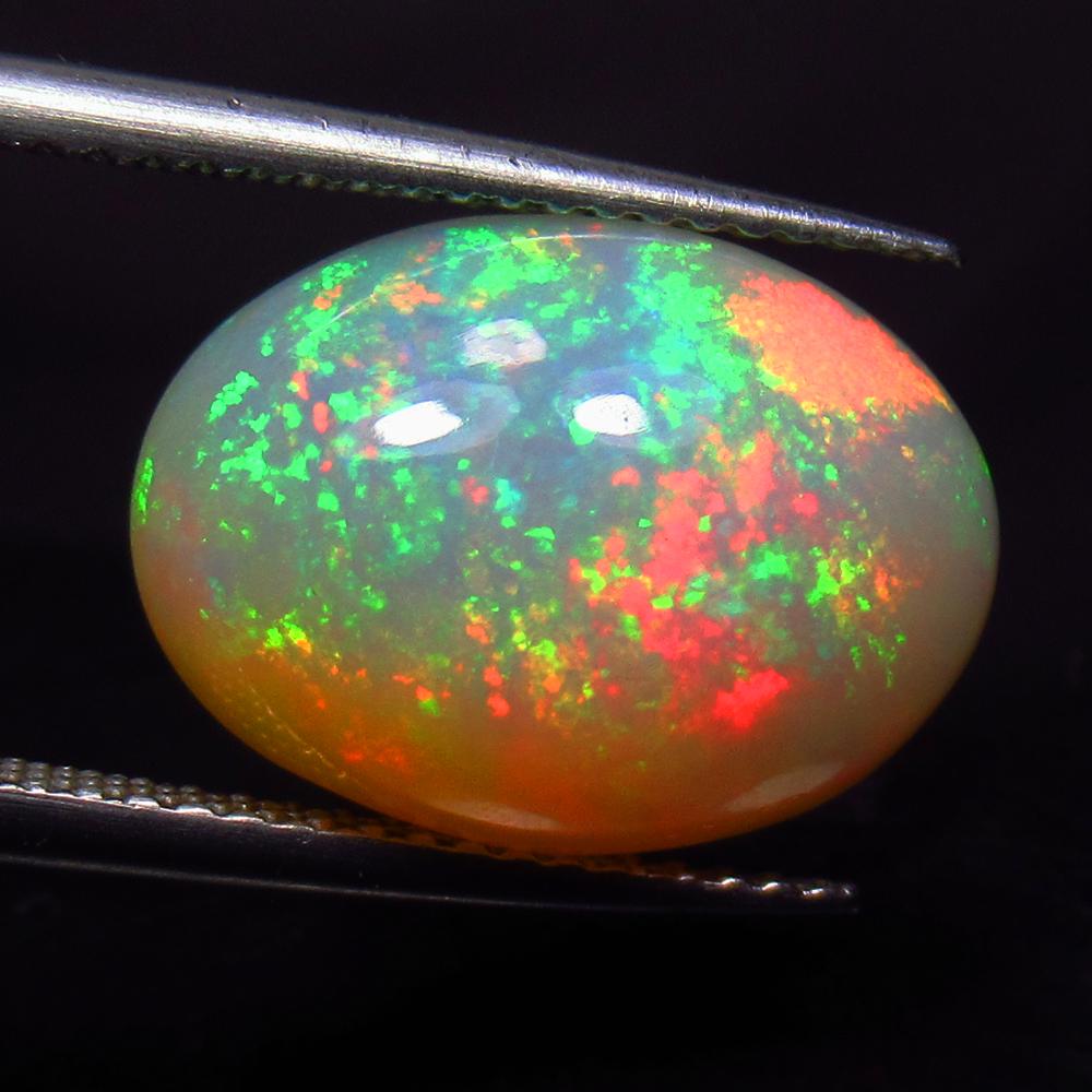 4.70 Ct Natural Ethiopian Multicolor Fire Opal Oval Cab (1 of 2)
