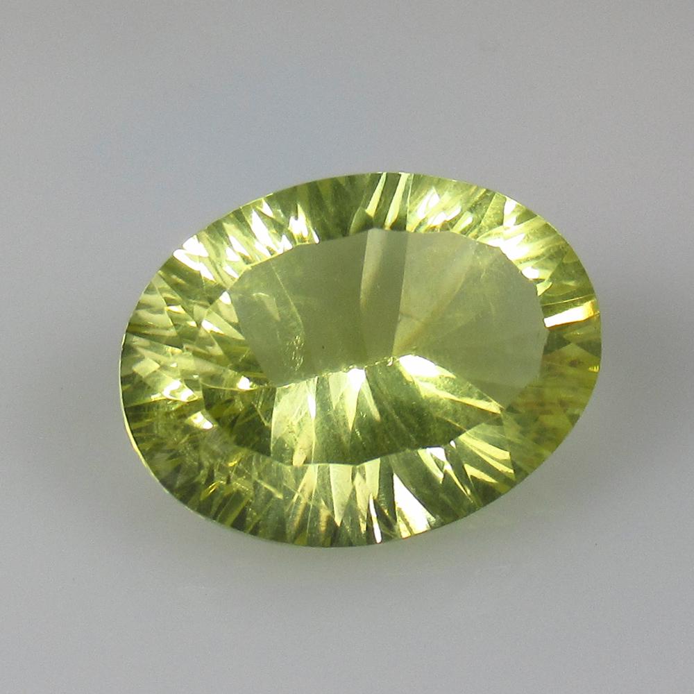 15.72 Ct Natural Lemon Quartz Concave Cut: No Reserve! Title: 15.72 Ct Natural Lemon Quartz Concave Cut Stone Clarity: VVS Gemstone: Natural Lemon Quartz Carat Weight: 15.72 Dimensions: 19.30 x 14.70 x 10.00 mm Additional Information: Good Lus