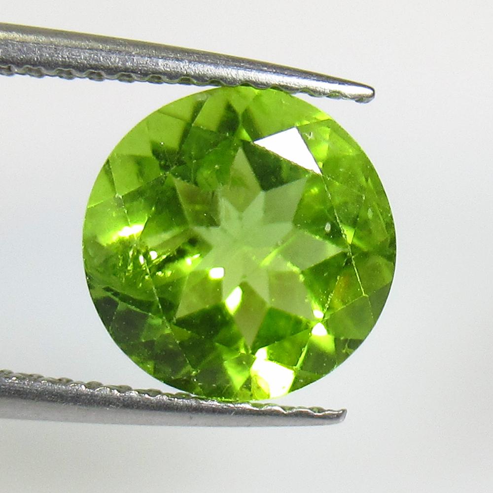 2.74 Ct Natural Pakistan Peridot Round Cut: No Reserve! Title: 2.74 Ct Natural Pakistan Peridot Round Cut Stone Clarity: VVS Gemstone: Natural Peridot Carat Weight: 2.74 Dimensions: 9.00 x 9.00 x 5.10 mm Additional Information: Top Class Full L