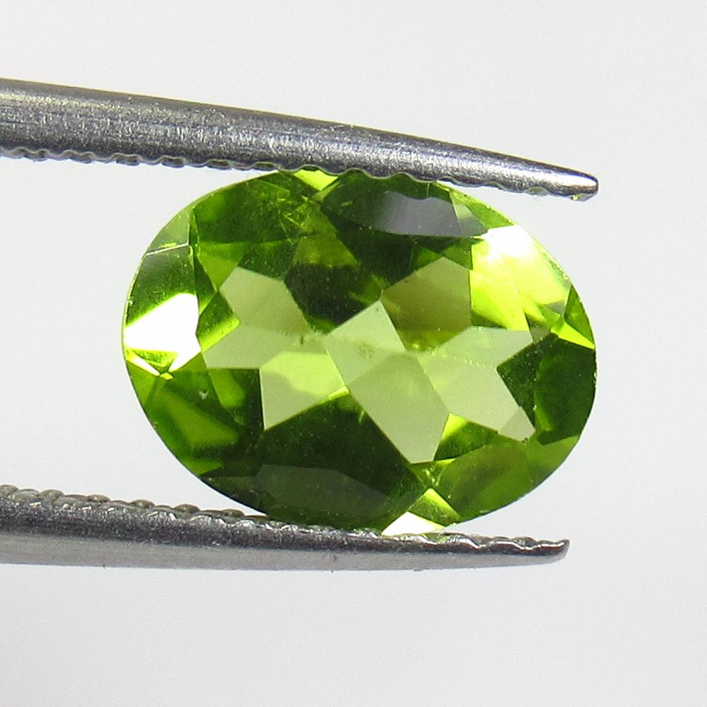 1.46 Ct Natural Pakistan Peridot Oval Cut: No Reserve! Title: 1.46 Ct Natural Pakistan Peridot Oval Cut Stone Clarity: VVS Gemstone: Natural Peridot Carat Weight: 1.46 Dimensions: 9.00 x 6.90 x 3.70 mm Additional Information: Top Class Luster 