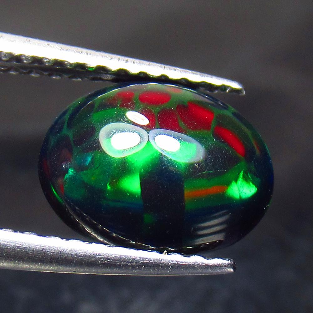 1.21 Ct Natural Ethiopian Black Fire Opal Oval Cab (1 of 2)