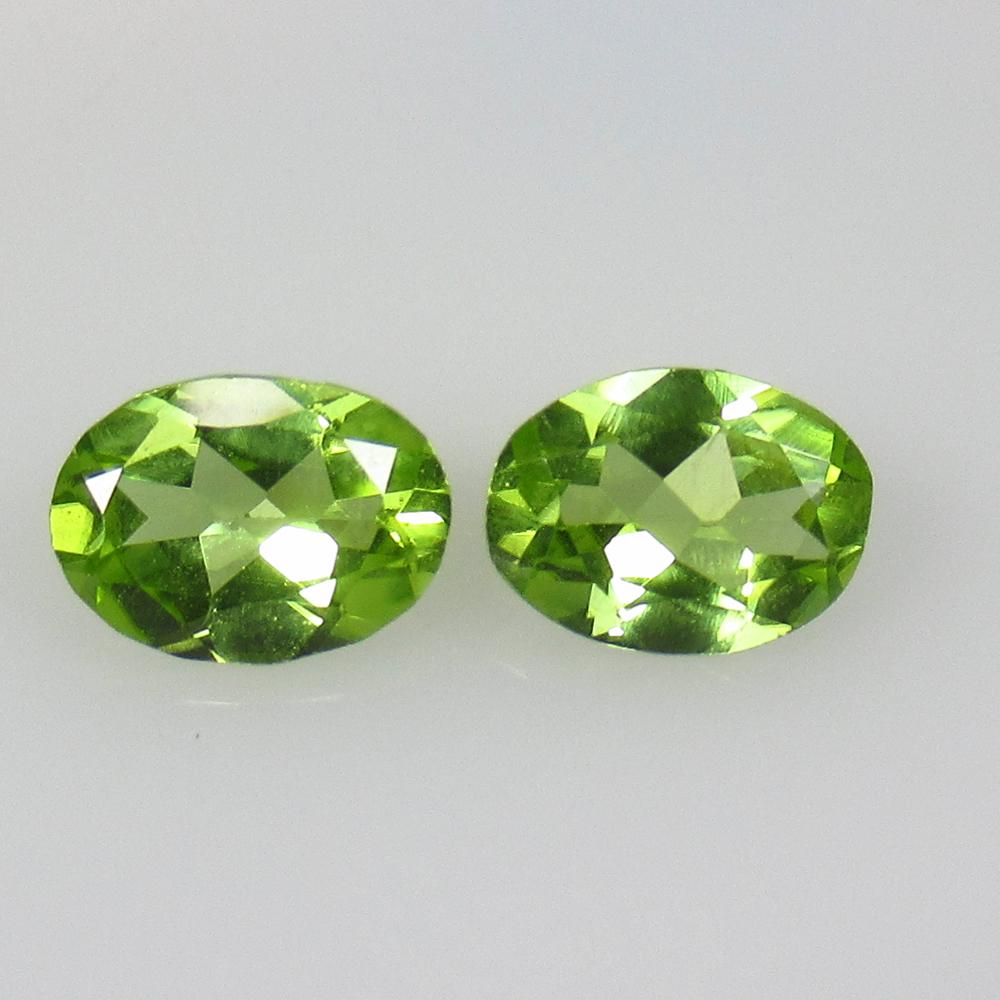 2.02 Ct Natural Pakistan Peridot Oval Pair: No Reserve! Title: 2.02 Ct Natural Pakistan Peridot Oval Pair Stone Clarity: VVS Gemstone: Natural Peridot Carat Weight: 2.02 Dimensions: 8.00 x 6.00 x 3.40 mm / 2 PC's Additional Information: Top Cla