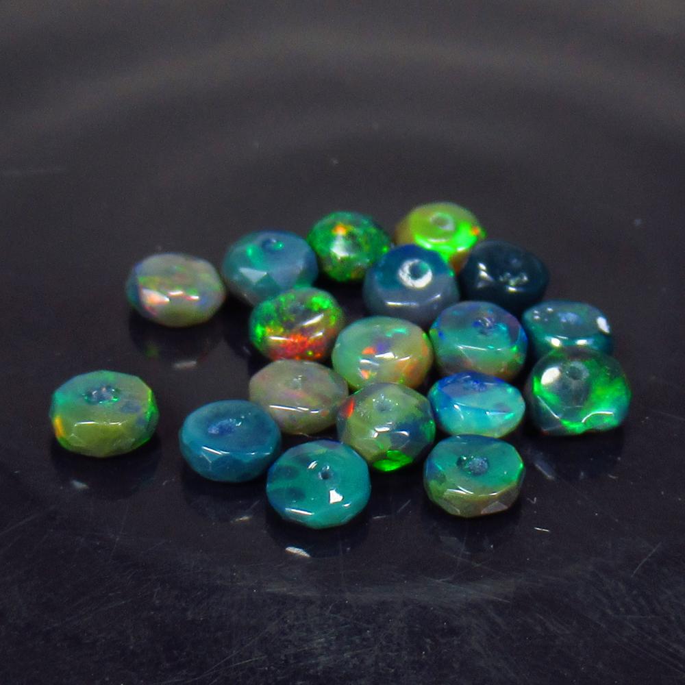 4.83 Ct Natural 20 Drilled Black Faceted Fire Opal: No Reserve! Title: 4.83 Ct Natural 20 Drilled Black Faceted Fire Opal Beads Stone Clarity: Translucent Gemstone: Natural Faceted BlackOpal Beads Carat Weight: 4.83 Dimensions: 4.30 to 4.60 mm / 20 PC'
