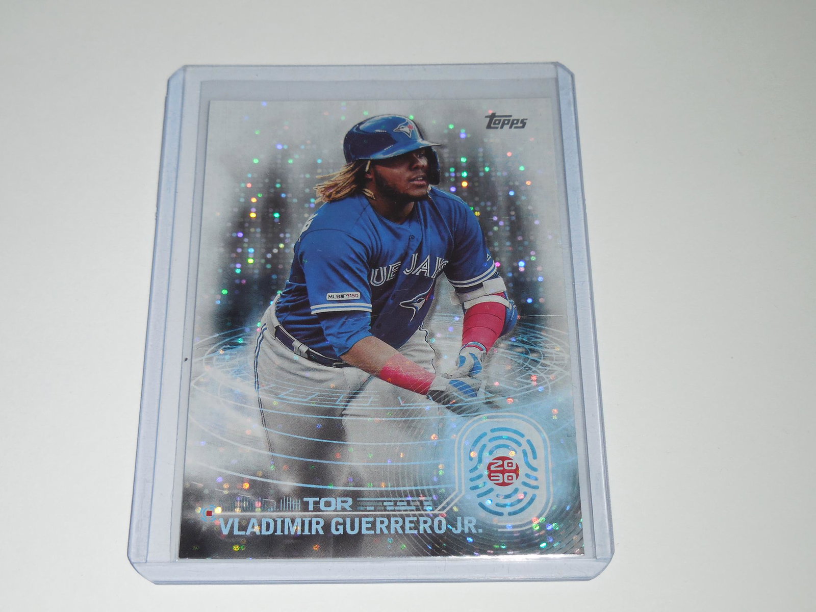 2020 TOPPS VLADIMIR GUERRERO JR 2030 HOLO BLUE JAYS: Title: 2020 TOPPS VLADIMIR GUERRERO JR 2030 HOLO BLUE JAYS Description: A VERY NICE CARD FOR ANY SPORTS COLLECTOR OR SPORTS FAN! THIS CARD COMES WITH A SLEEVE AND TOP LOADER. THE ACTUAL CARD YOU'RE VI