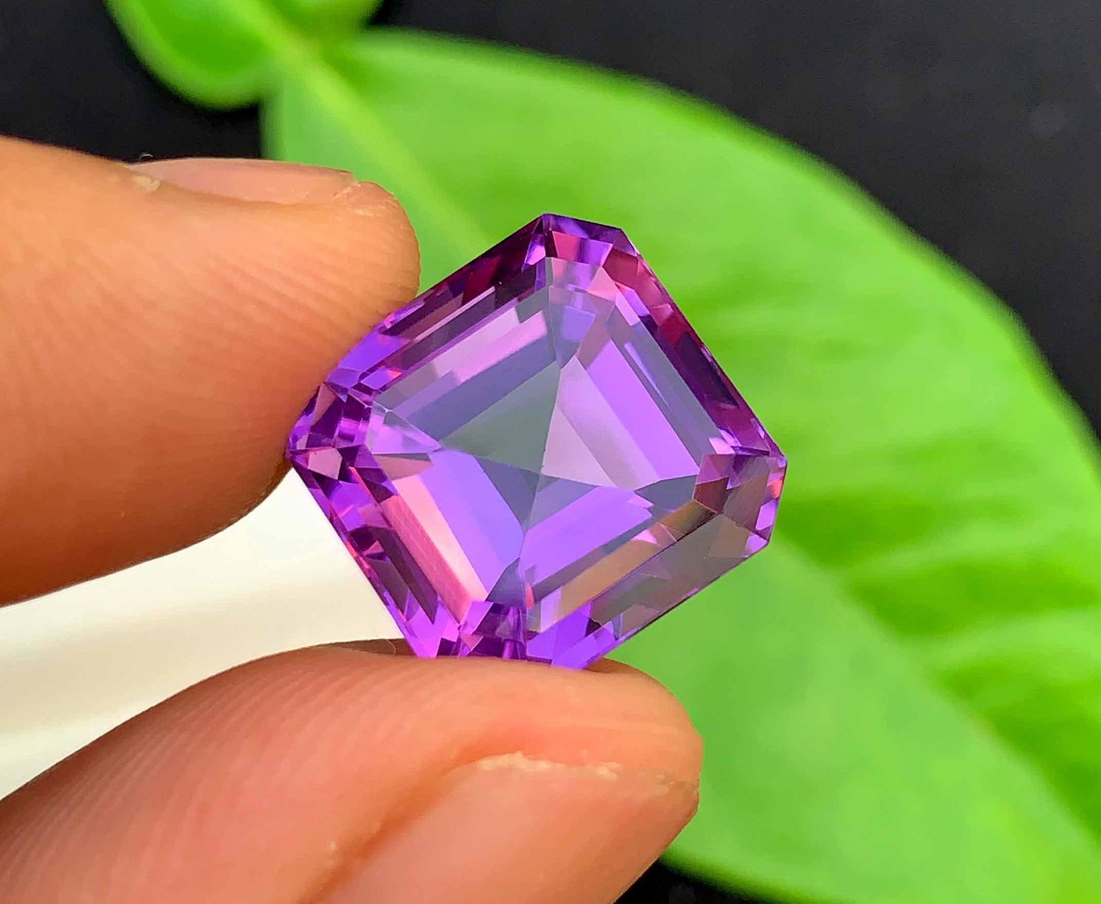 Asscher Cut Amethyst Loose Gemstone - 12.45 carats: Materials: Gem type: Amethyst Carat weight: 12.45 Description Asscher Cut Amethyst Loose Gemstone weight - 12.45 carats dimensions - 14*13.5*10.2 mm Treatment : Natural DHL E Commerce SHIPPING Reserve