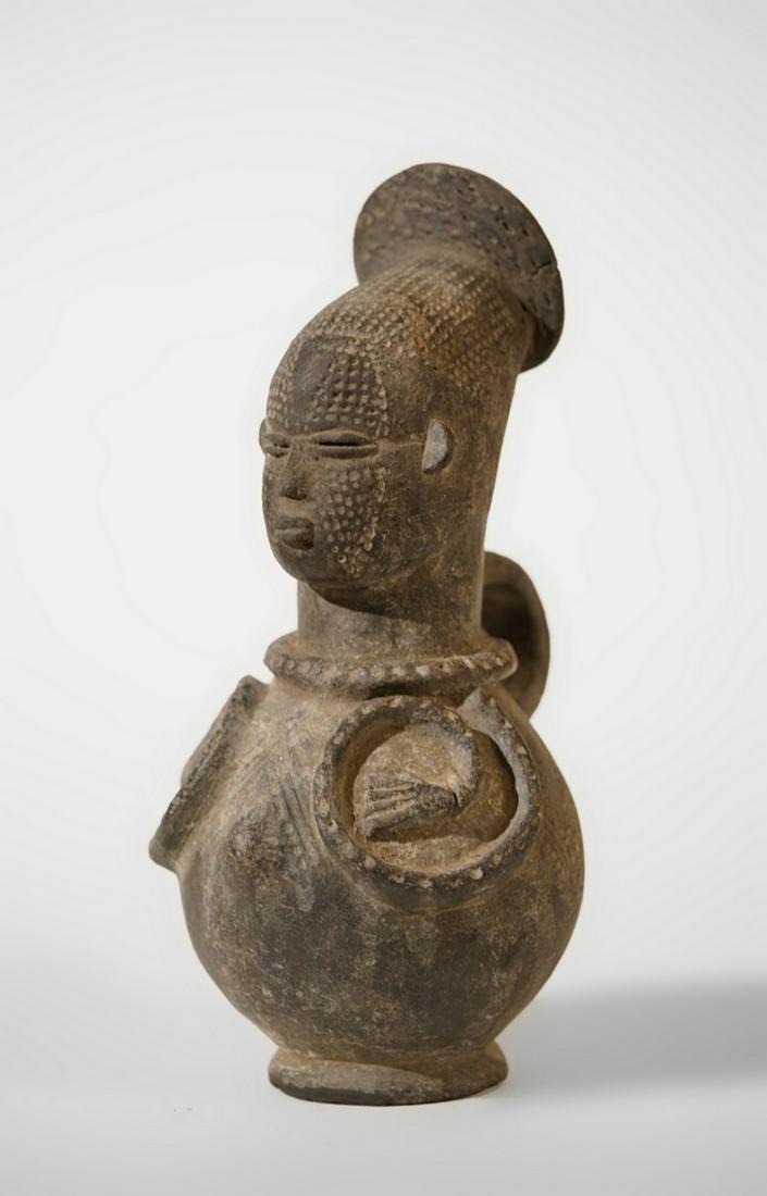 A Mangbetu Teracotta Vessel: Title: A Mangbetu Teracotta Vessel Origin: RD Congo Materials: Terracotta Size: 36 cm Description: A Mangbetu Teracotta Vessel, Zaire. The Mangbetu are a people of Central Africa present in the north-