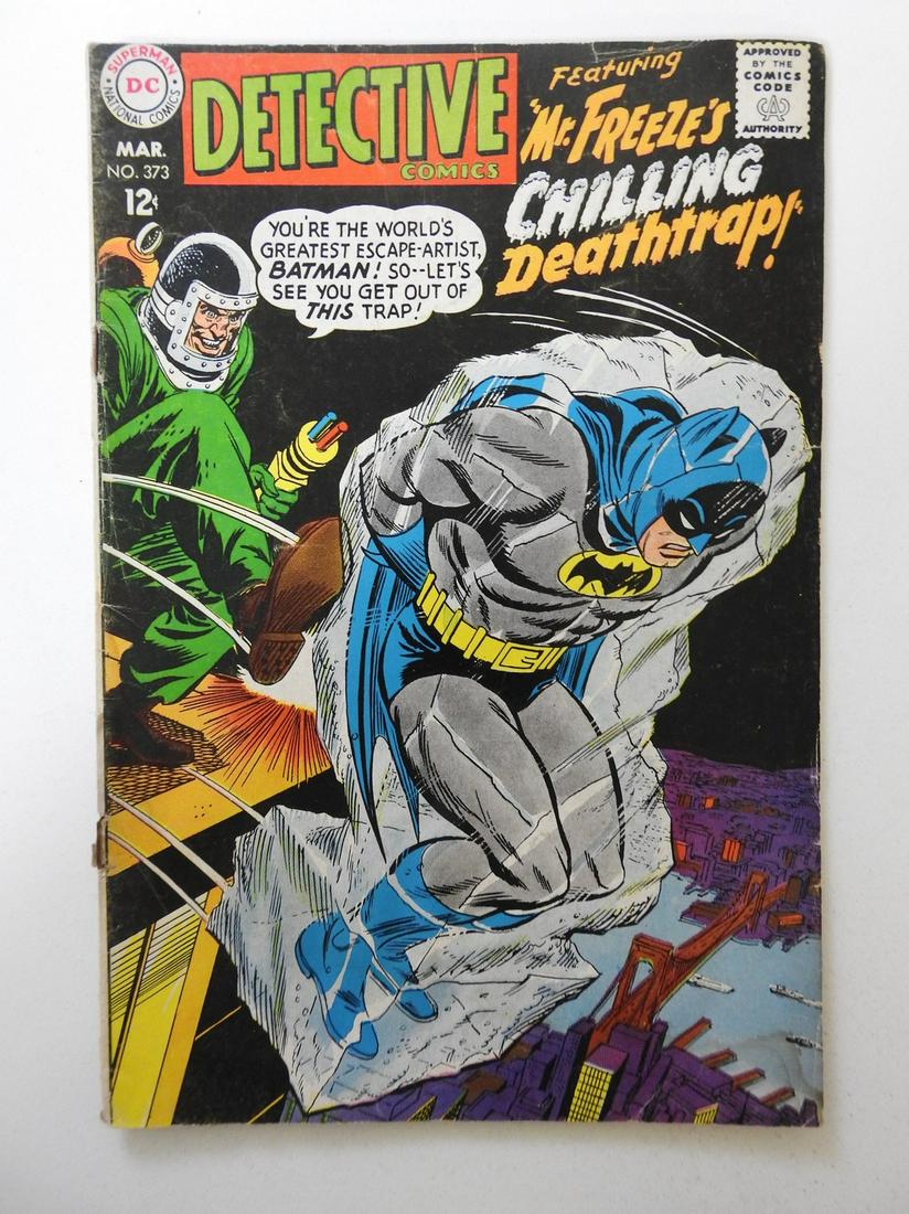 Detective Comics #373: No Reserve! Detective Comics #373 GD Cover and 1st wrap detached from bottom staple, centerfold detached at both staples, bottom staple rusty Shipping: Domestic: Flat-rate of $9.99 (1-8 items) or $19.