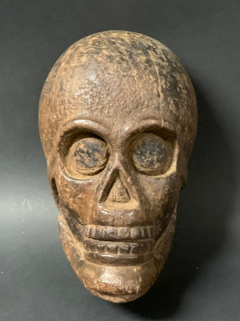 Carved Wood Skull Paper Mache Mold: Title: Carved Wood Skull Paper Mache Mold Date/Period: Early 20th Century Dimension: 8.25 inches high x 5 inches wide Material: Wood Additional Information: Folk Art Decorative Skull Paper Mache Mold 