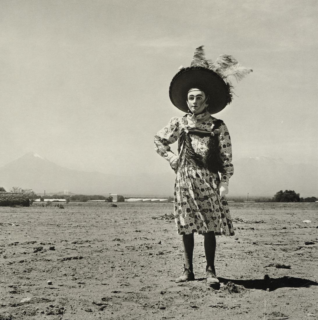 GRACIELA ITURBIDE - Carnival, Tlaxacala, 1974: Artist: Graciela Iturbide Title: Carnaval (Carnival), Tlaxacala, State of Tlaxcala, 1974 Medium: Photo Litho, 1996, Italy Dimensions: 8.45x8.5" Description: Heat Wax Mounted on 11x14" Conservation Boa