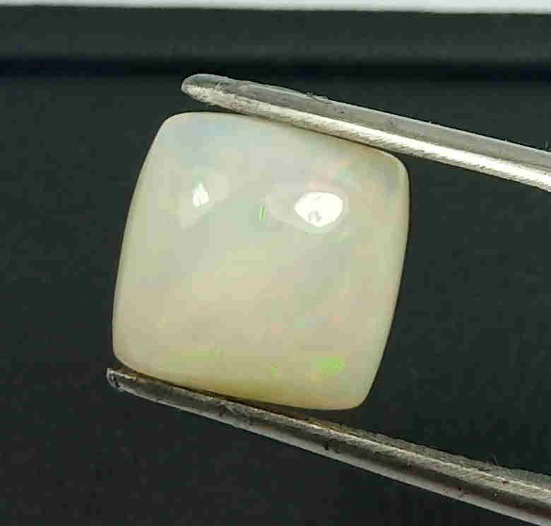 4.10 CTS NATURAL WELO WHITE OPAL CUSHION SHAPE MILKY: 4.10 CTS NATURAL WELO WHITE OPAL CUSHION SHAPE MILKY WHITE LOOSE GEMSTONES Reserve: $15.00 Shipping: Domestic: Flat-rate of $10.00 to anywhere within the contiguous U.S. International: Foreign shippin