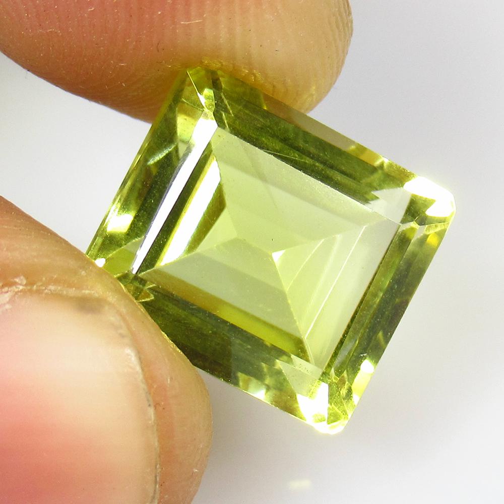 9.68 Ctw Natural Lemon Quartz Octagon Cut: No Reserve! Title: 9.68 Ctw Natural Lemon Quartz Octagon Cut Stone Clarity: VVS Gemstones: Lemon Quartz Carat Weights: 9.68 Size/Dimensions: 12.80 x 11.30 x 8.50 mm Additional Information: Good Luster