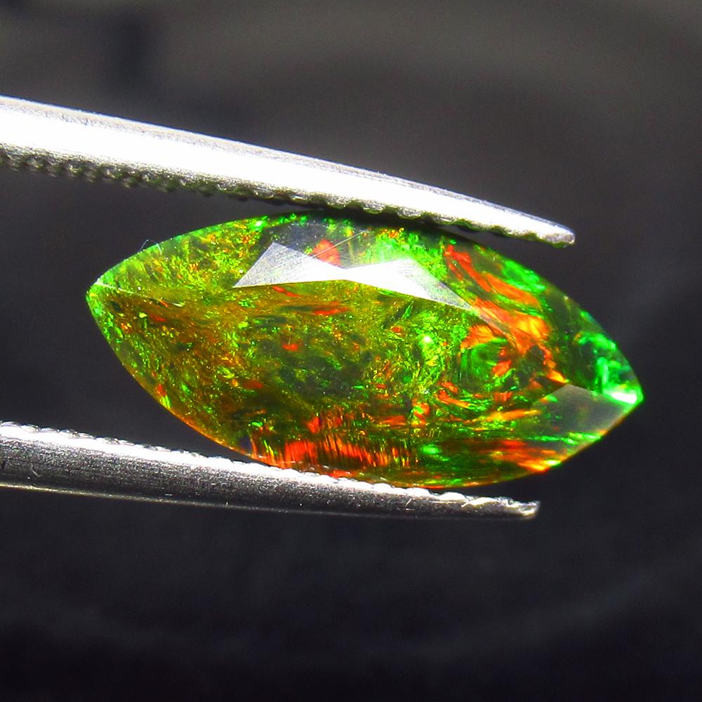 1.71 Ctw Natural Ethiopian Black Fire Opal Marquise Cut: No Reserve! Title: 1.71 Ctw Natural Ethiopian Black Fire Opal Marquise Cut Stone Clarity: Translucent Gemstones: Black Opal Carat Weights: 1.71 Size/Dimensions: 13.40 x 6.30 x 5.30 mm Additional Infor