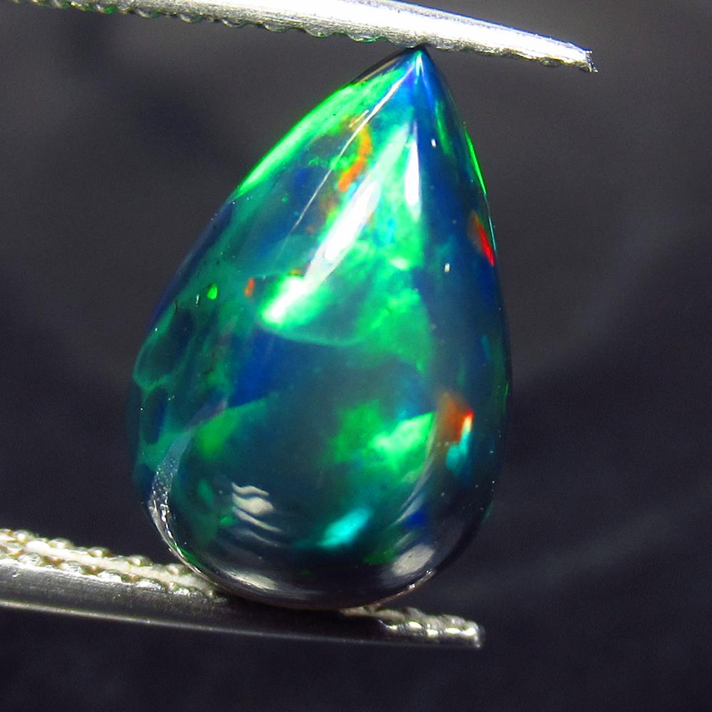 2.58 Ctw Natural Ethiopian Black Fire Opal Pear Cab: No Reserve! Title: 2.58 Ctw Natural Ethiopian Black Fire Opal Pear Cab Stone Clarity: Translucent Gemstones: Black Opal Carat Weights: 2.58 Size/Dimensions: 12.20 x 8.20 x 5.90 mm Additional Informati