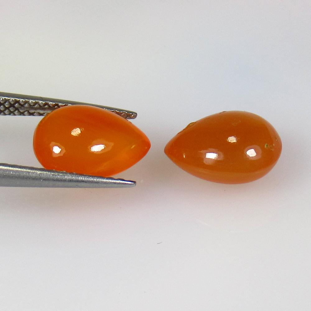 5.32 Ctw Natural Orange Carnelian Pear Pair: No Reserve! Title: 5.32 Ctw Natural Orange Carnelian Pear Pair Stone Clarity: Semi-Transparent Gemstones: Carnelian Carat Weights: 5.32 Size/Dimensions: 10.20 x 8.50 x 5.50 mm / 2 PC's Additional Info