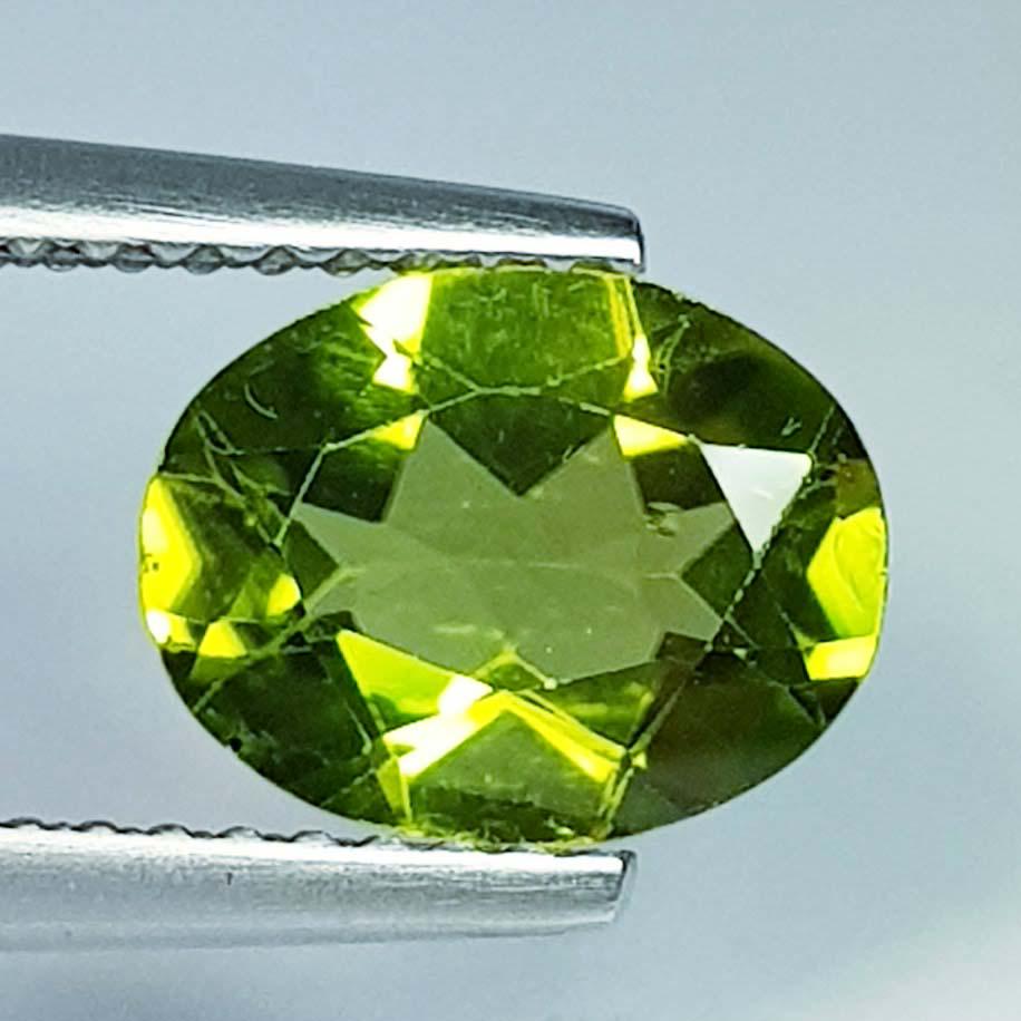 1.82 Ct Natural Peridot Oval Cut: No Reserve! Title: 1.82 Ct Natural Peridot Oval Cut Color/Clarity: IF - VVS Gemstones: Loosegemstone Carat Weights: 1.82 Size/Dimensions: 9.00 x 7.00 x 4.00 Additional Information: Oval / Pakistan Shi